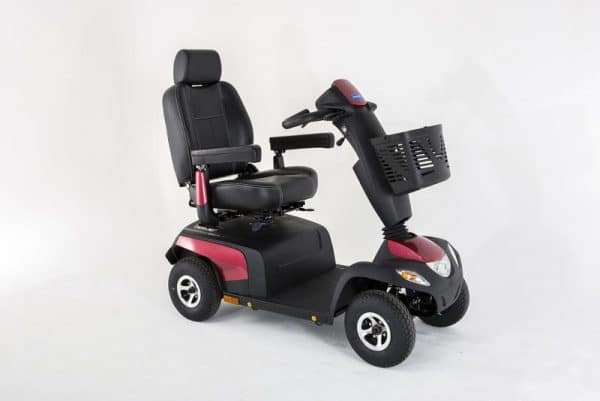 A red Invacare Orion Pro 4 wheel scooter